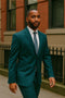 teal-suit-with-navy-tie