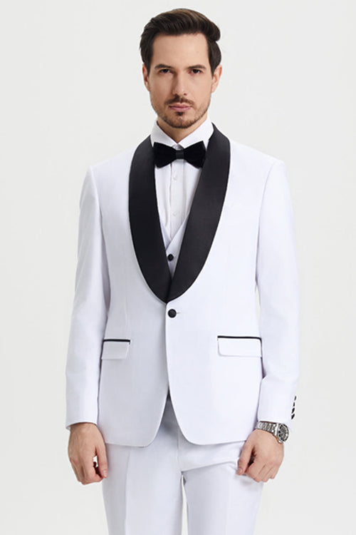White Stacy Adams tuxedo with black satin shawl lapel, single button, and matching vest. Features two front pockets with black trim and white trousers.