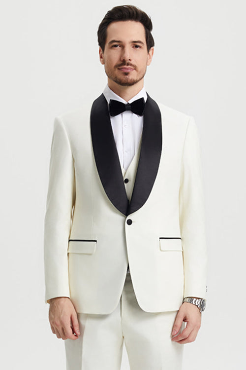 Ivory Stacy Adams men's tuxedo with black shawl lapel and trim. Single-button closure, structured fit. Includes matching ivory vest and trousers.