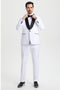 Men's white Stacy Adams tuxedo. Tailored fit, single-button closure, black shawl lapel, and matching white trousers. Features black-trimmed pockets. Worn with a bow tie and black shoes for a formal look.