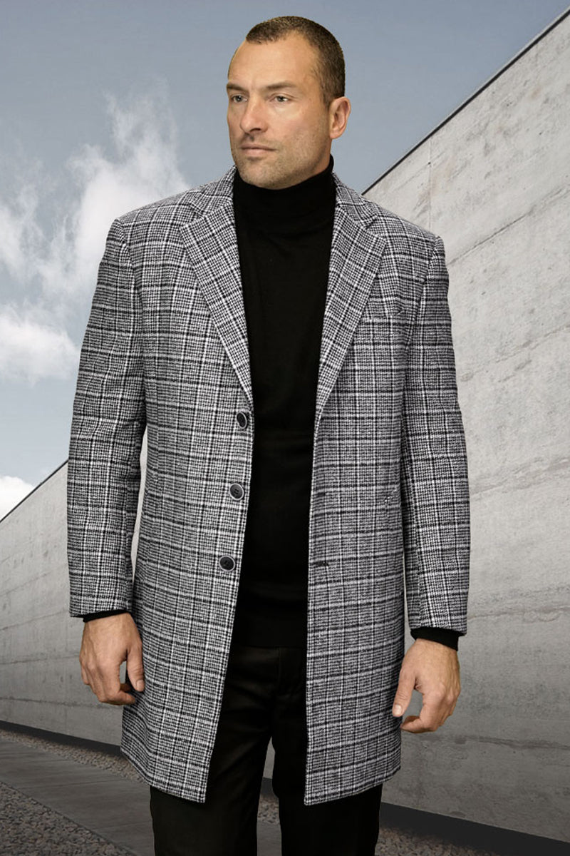 Men's brown plaid winter car coat. 100% wool, long, notched lapel, three-button closure. Straight sleeves, tailored fit, falls below hips. Varying brown shades create textured plaid.