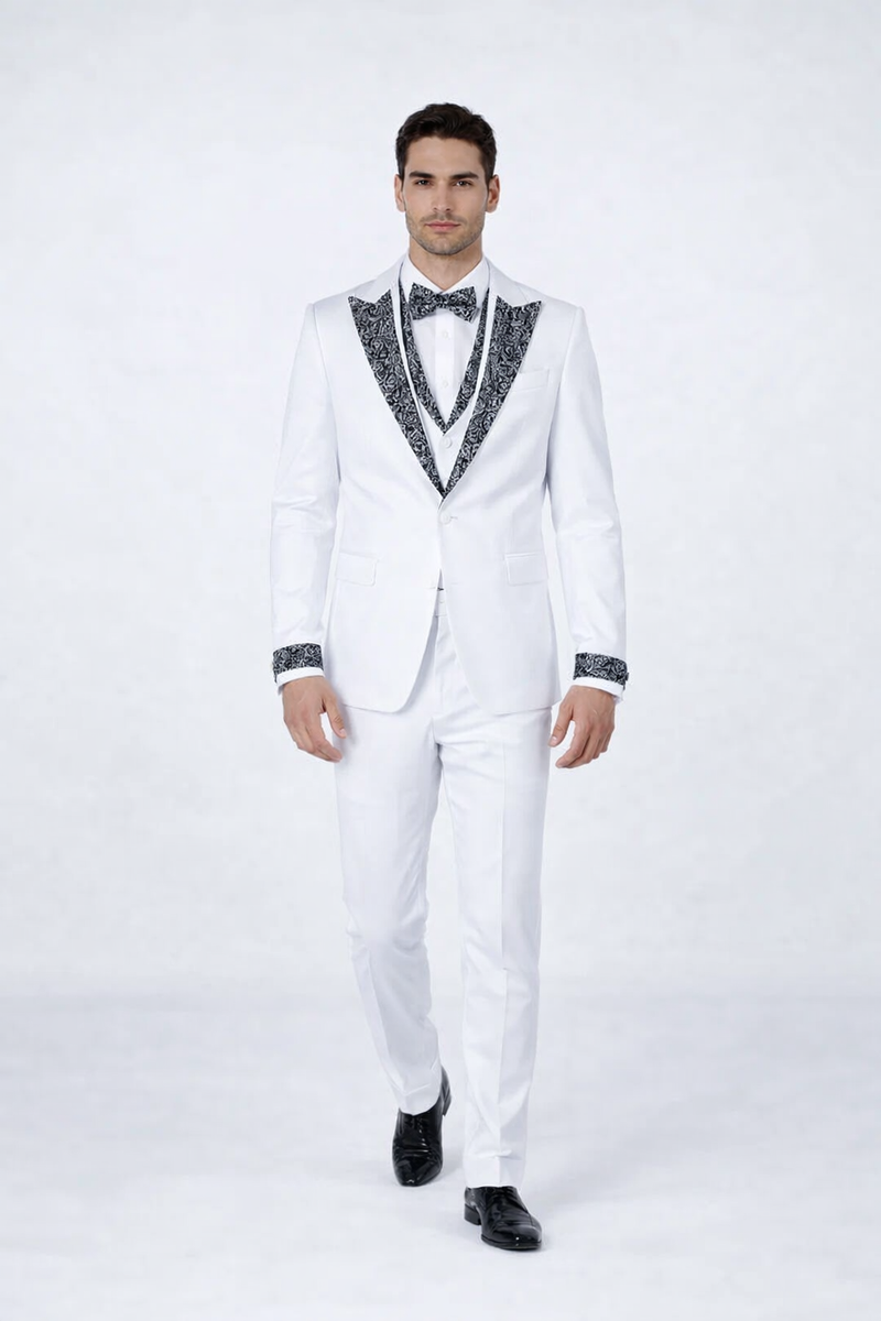 White men's tuxedo with black stone accents. Features a fitted white jacket with patterned black shawl lapel and cuffs, plus white trousers. Perfect for prom or weddings.