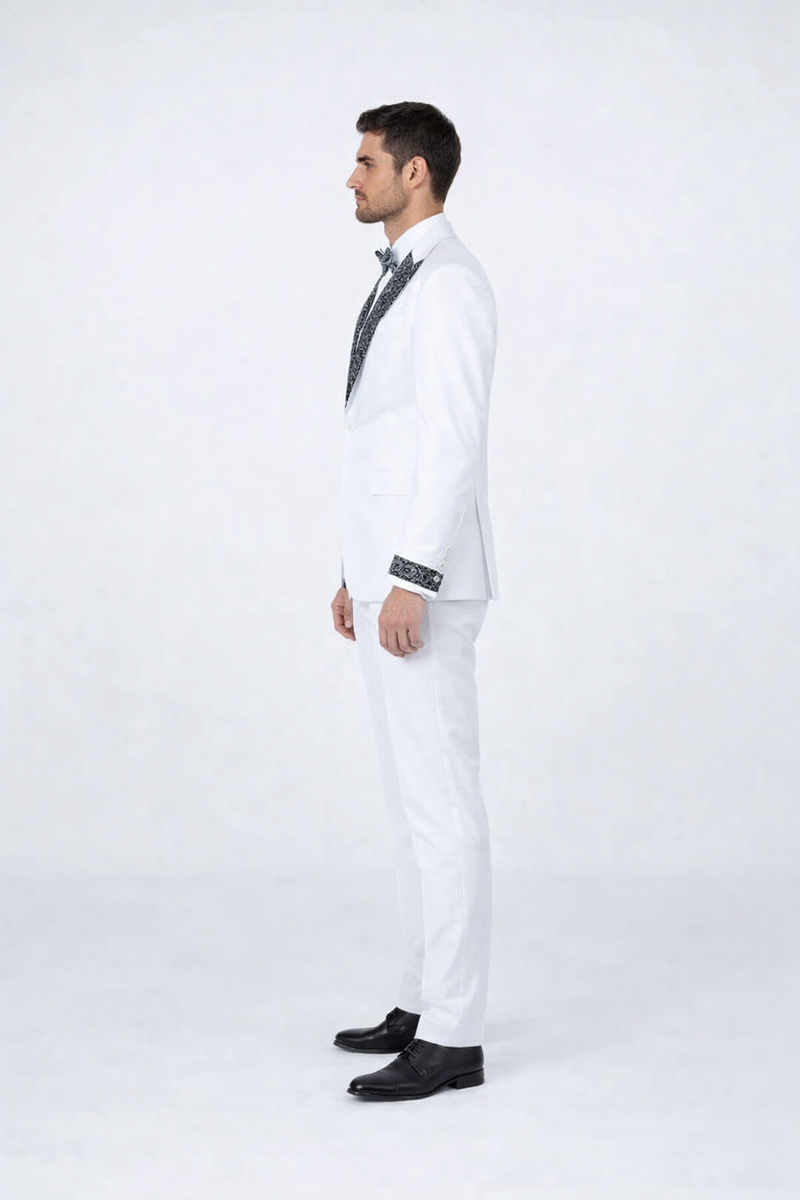 Men's white tuxedo with fitted silhouette, black stone lapel/cuffs. Single-button jacket, matching trousers. Perfect for prom or weddings.