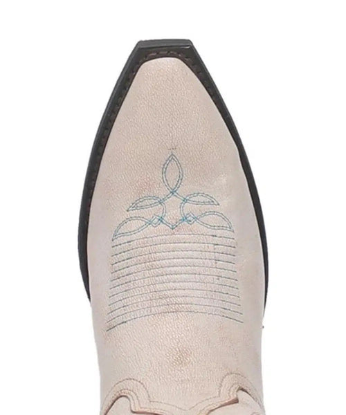 Laredo Keyla boots: Light beige leather, pointed toe, and decorative blue stitching. Black sole. Stylish and eye-catching women's boot.