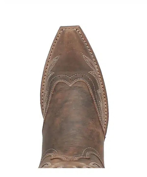 Laredo Zuri boot: Pointed toe, brown leather, decorative stitching, and intricate raised patterns. Subtle color variations enhance texture and design contours.