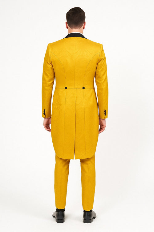 Yellow tailcoat tuxedo. Structured back, tailored fit, black lapel. Brocade texture, vintage style. Long back, two buttons. Matching yellow trousers.