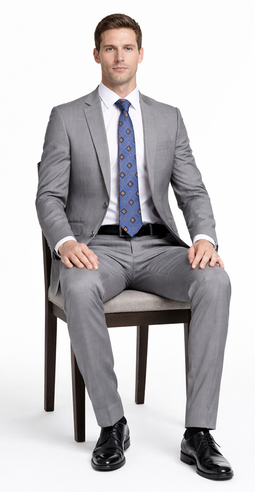 Bertolini light gray wool-silk blend suit: 2- or 3-piece, tailored fit. Single-breasted jacket, straight-leg trousers. Soft, textured blend. Versatile, neutral color. Two-button jacket, notched lapel. Sleek silhouette.