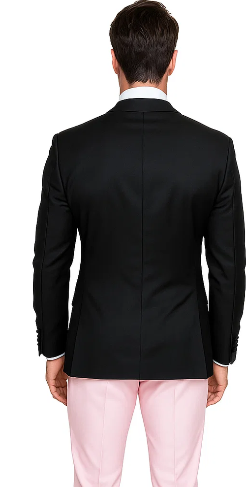 Black, double-breasted wool tuxedo jacket with peak lapel & long sleeves, paired with pink trousers. Made of 100% wool.