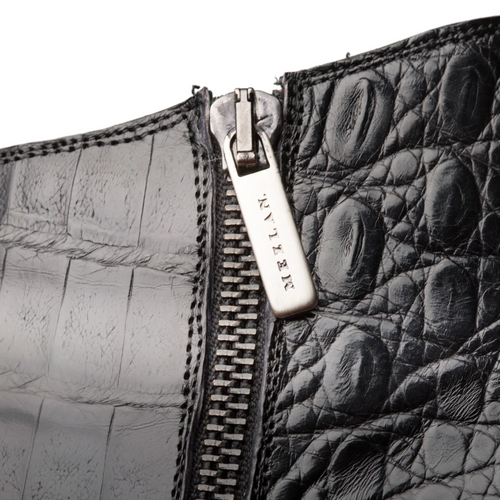 Black Mezlan Blackmore dress boots: sleek black leather with crocodile skin texture. Side silver zipper closure. Visible stitching adds detail.