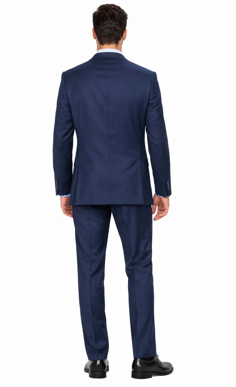 Carlo Lusso French Blue suit by Albertonardoni. Tailored fit, structured silhouette in solid French blue. Two-button closure, notched lapels, vented back. Straight-leg pants, button-detailed cuffs.