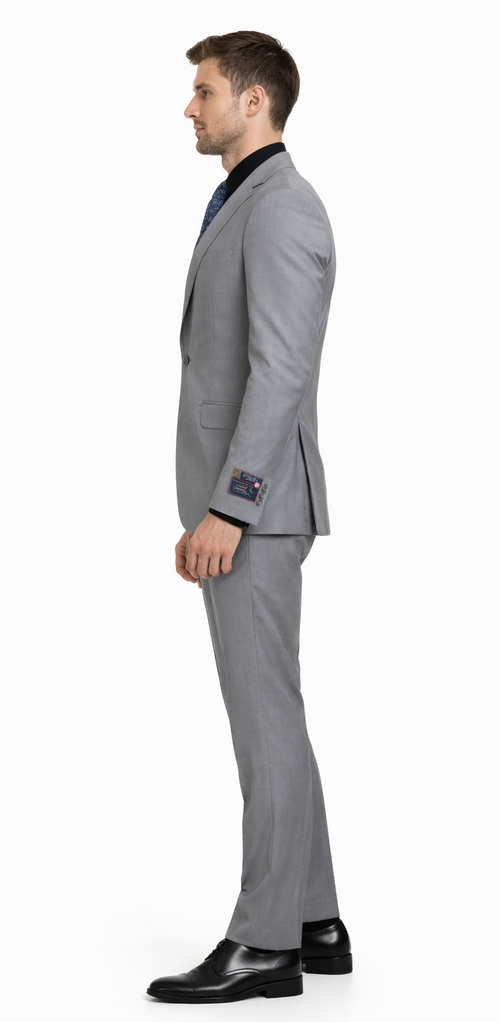 Carlo Lusso medium gray suit with 2-button closure. Poly blend fabric. Jacket: notched lapel, decorative cuffs. Trousers: slim fit, straight leg.