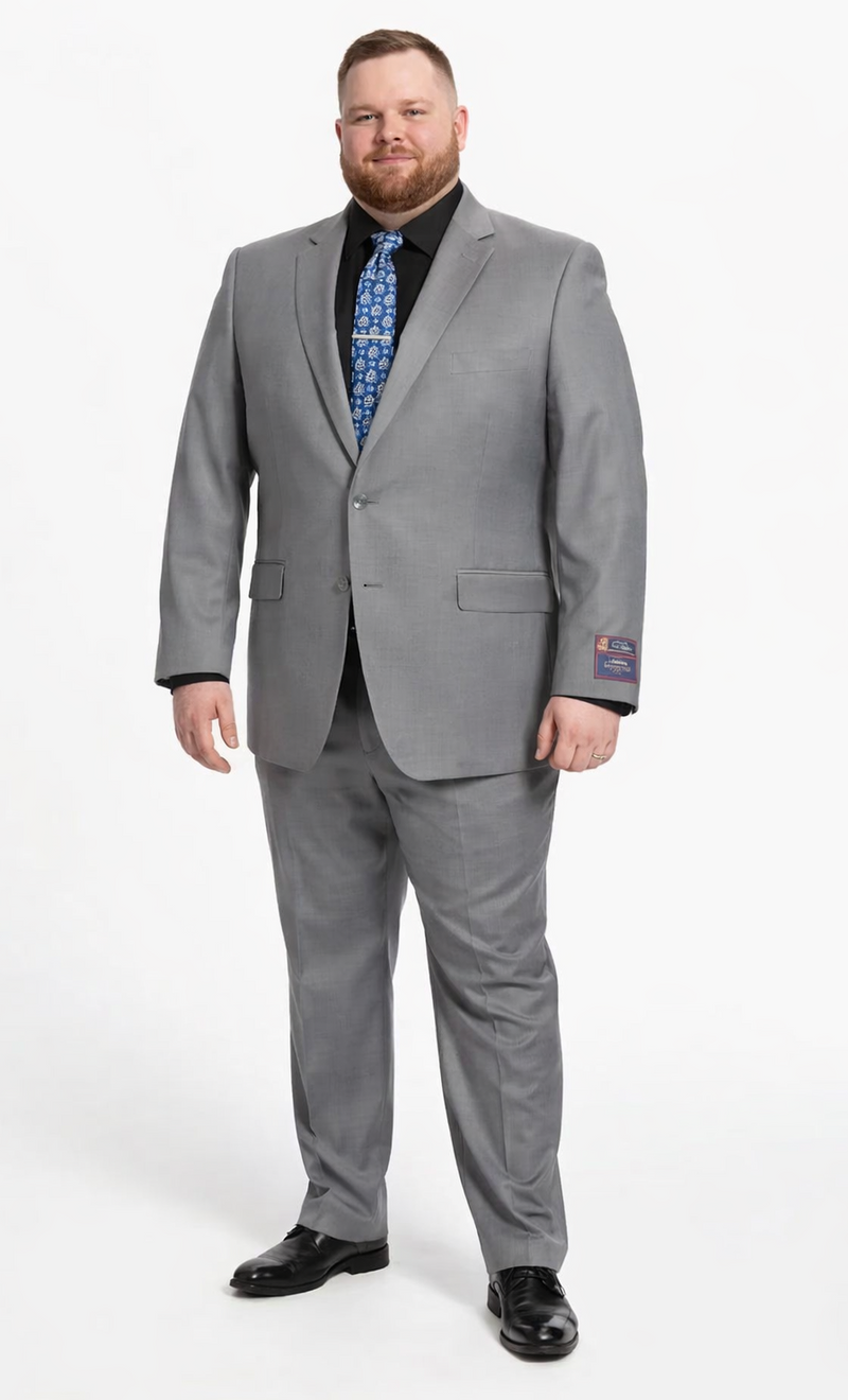 Albertonardoni Carlo Lusso suit: medium gray, two-button, tailored fit. Poly blend with subtle sheen. Features structured shoulders, notch lapels, and tapered trousers. Classic and versatile.