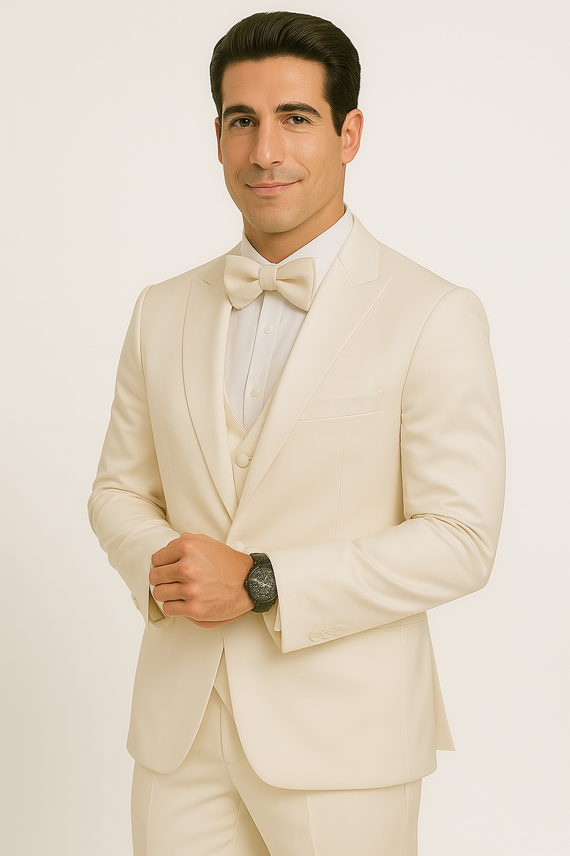 Champagne Majesty tuxedo: 4-piece formal set. Features a fitted jacket, matching waistcoat, trousers, and bow tie. Crafted from smooth, light champagne fabric. Tailored fit, structured shoulders, and sleek lines. Includes a white dress shirt.