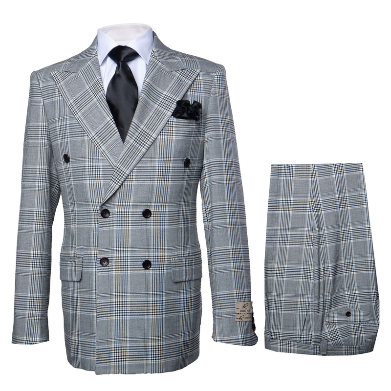 Black and white plaid double-breasted suit. Jacket: peak lapels, pockets. Pants: wide-leg, baggy, pleated, matching fabric.