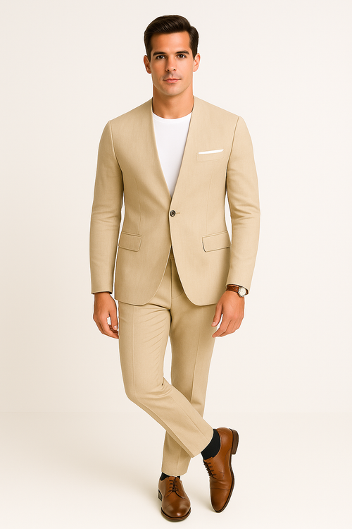 Tan linen suit. Collarless blazer with single button and two pockets. Tailored pants. Smooth texture. Solid light tan color.