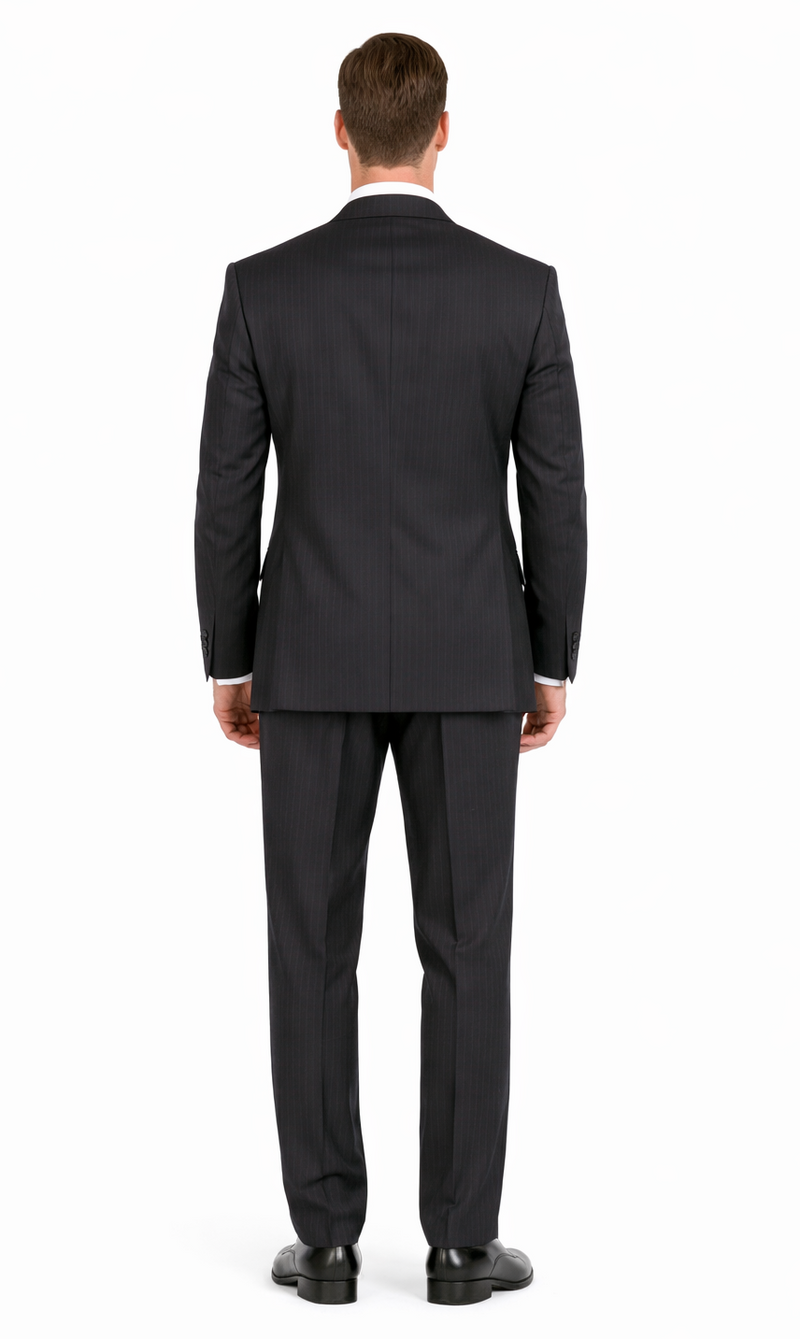 Dark navy double-breasted suit with subtle pinstripes. Fitted design, structured shoulder, and tailored trousers. Smooth fabric suggests formal wear.