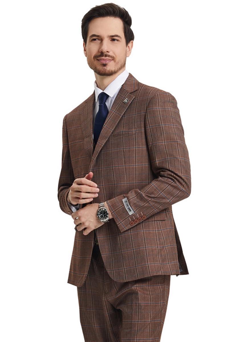 Light brown Stacy Adams men's suit. Modern fit, windowpane plaid. Single-breasted jacket, matching vest and trousers. Tailored silhouette. Light brown base with dark brown/blue plaid. Notch lapels, button cuffs.