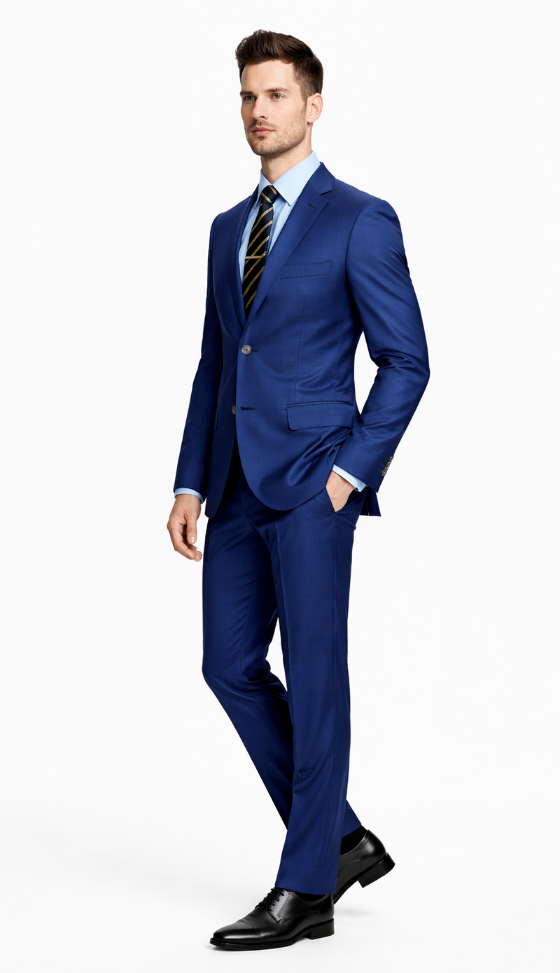Albertonardoni Galante Uomo Italian blue suit: single-breasted jacket, notch lapels, smooth fabric. Flat-front trousers, light blue shirt, striped tie, black dress shoes. Tailored silhouette, subtle sheen.