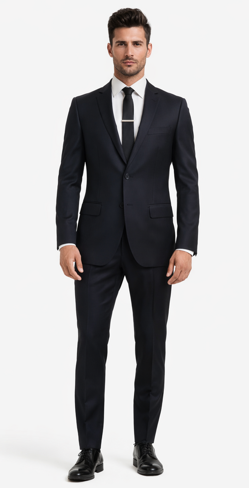 Albertonardoni black wool suit: slim fit, single-breasted jacket with notch lapels, straight-leg trousers. Paired with white shirt, black tie & silver clip, black dress shoes.