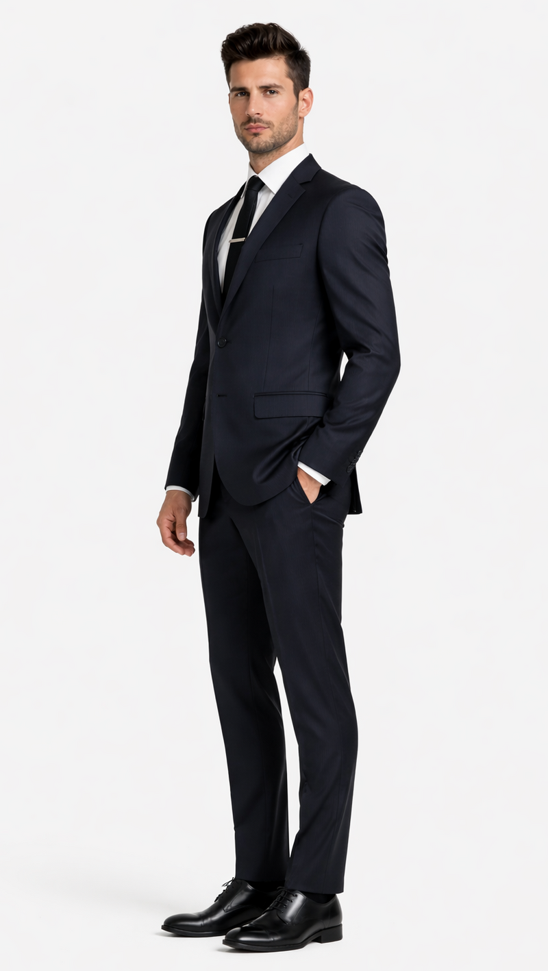Italian-made Albertonardoni black wool suit with subtle stripes. Features a fitted, two-button jacket with notch lapels and straight-cut trousers.