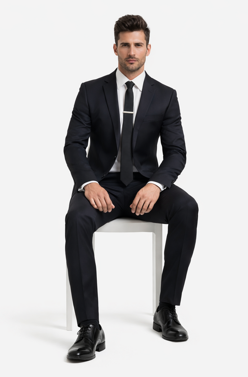 Albertonardoni black wool suit. Tailored fit, notched lapels, and button closure. Straight-leg trousers. Uniform color with a subtle sheen for a refined look.