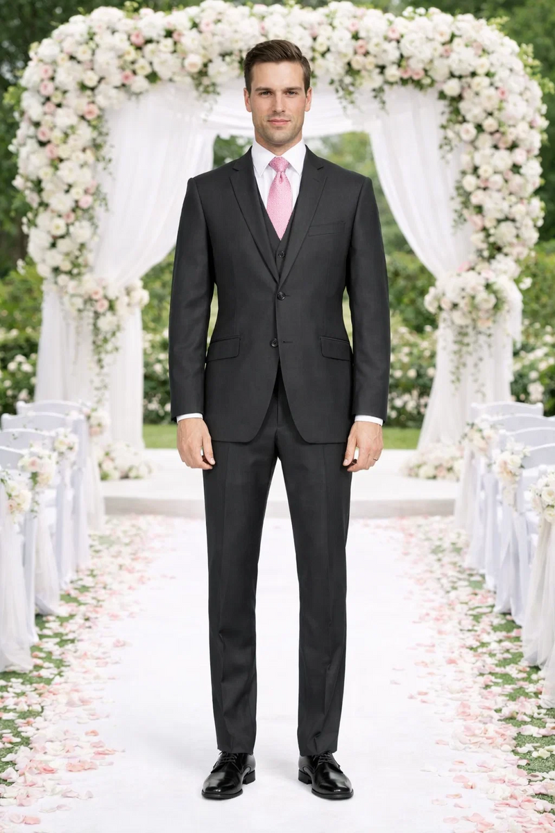 Giorgio Fiorelli charcoal/light gray two-button suit: tailored fit, notched lapel, smooth fabric. Includes jacket, slim trousers, light gray vest, and pink tie for contrast.