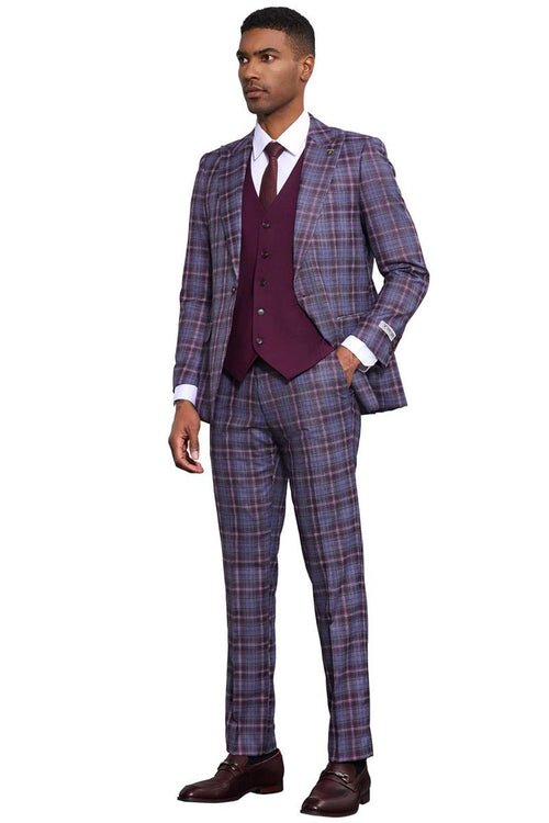 Stacy Adams men's suit in lavender purple. Bold windowpane plaid print with fitted blazer, vest, and trousers. Structured design with a cohesive purple color scheme and a subtle sheen. Tailored fit.