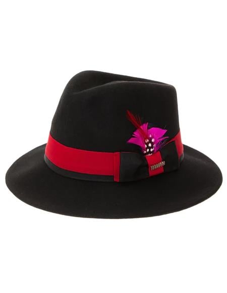 Black structured hat with a wide brim. It has a red band around the base, embellished with a bow and a decorative feather.