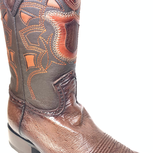 Los Altos brown ostrich quill cowboy boots. Tapered, rounded toe, raised heel. Intricate brown/orange stitching. Leather & ostrich quill for texture. Tall shaft with decorative panels and stitching.