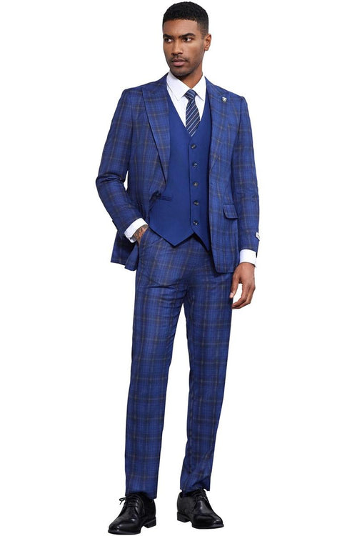 The men's Stacy Adams vested suit features a midnight blue bold windowpane plaid print. The suit includes a fitted jacket, a matching vest, and tailored trousers, all made from a smooth fabric.
