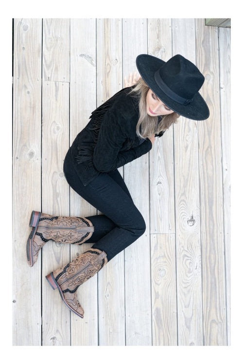 Honey leather Laredo women's boots with a broad square toe and decorative stitching. Featuring a cutout pattern, low stacked heel, and a stylish design.