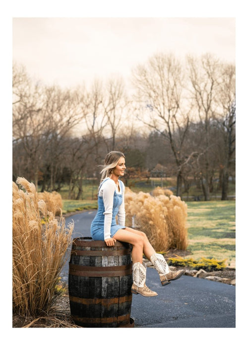 Laredo Women's Kite Days boots: Beige leather, broad square toe. White decorative stitching & embroidery. Slightly raised heel, ankle straps for structure. Textured look.