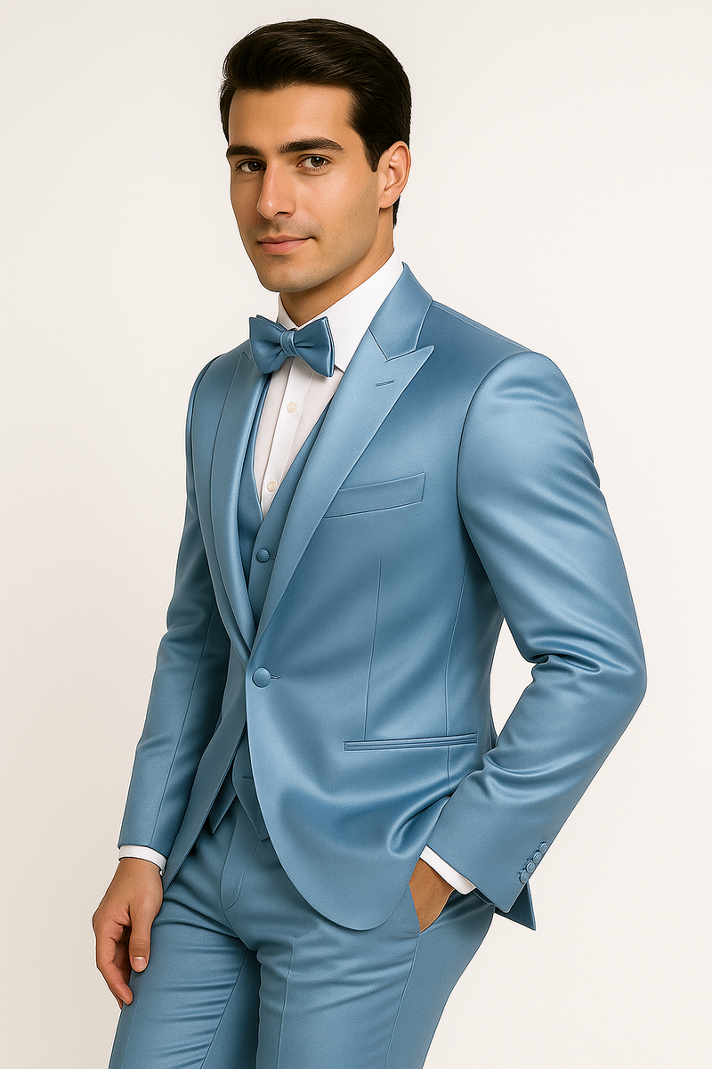 Light blue tuxedo set: fitted jacket, matching vest, and tailored trousers. Includes a bow tie. Sleek, contemporary design with structured lapels and pocket detailing. Uniform light blue color.