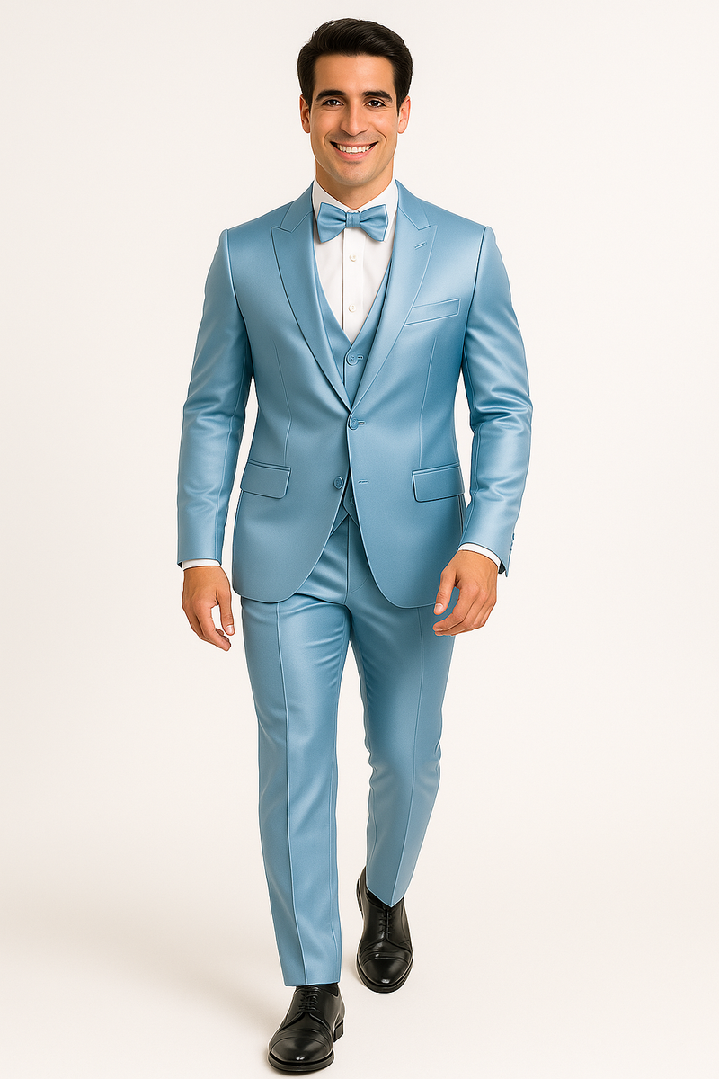 Alberto Nardoni's light blue tuxedo set: fitted jacket, waistcoat, and slim trousers. Smooth, shiny fabric, structured design. Single-breasted jacket, notch lapel. Includes matching bow tie, paired with a white dress shirt.
