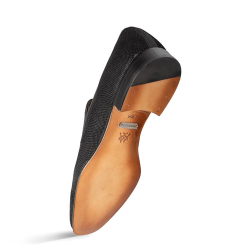 Mezlan Notte slip-on in black glass suede with a pointed toe. Features a textured upper and smooth leather sole. Slightly elevated heel for a streamlined look.