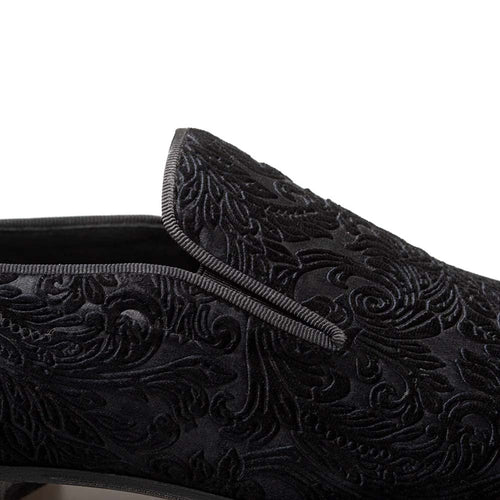Mezlan Travolta loafer: Black velvet with embossed floral pattern. Sleek, rounded shape with a trimmed edge. Formal and elegant.