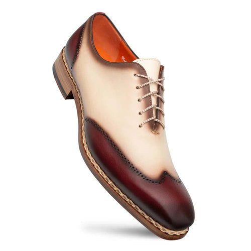 Mezlan Almagro oxford: Tapered two-tone design with red toe/sides and bone center. Closed lacing, decorative stitching, and a wooden heel complete the look.