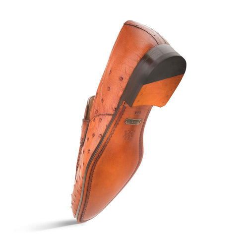Mezlan Lisbon penny loafers in side view. Brandy ostrich quill texture. Elongated shape, leather sole, slightly raised heel. Smooth finish.
