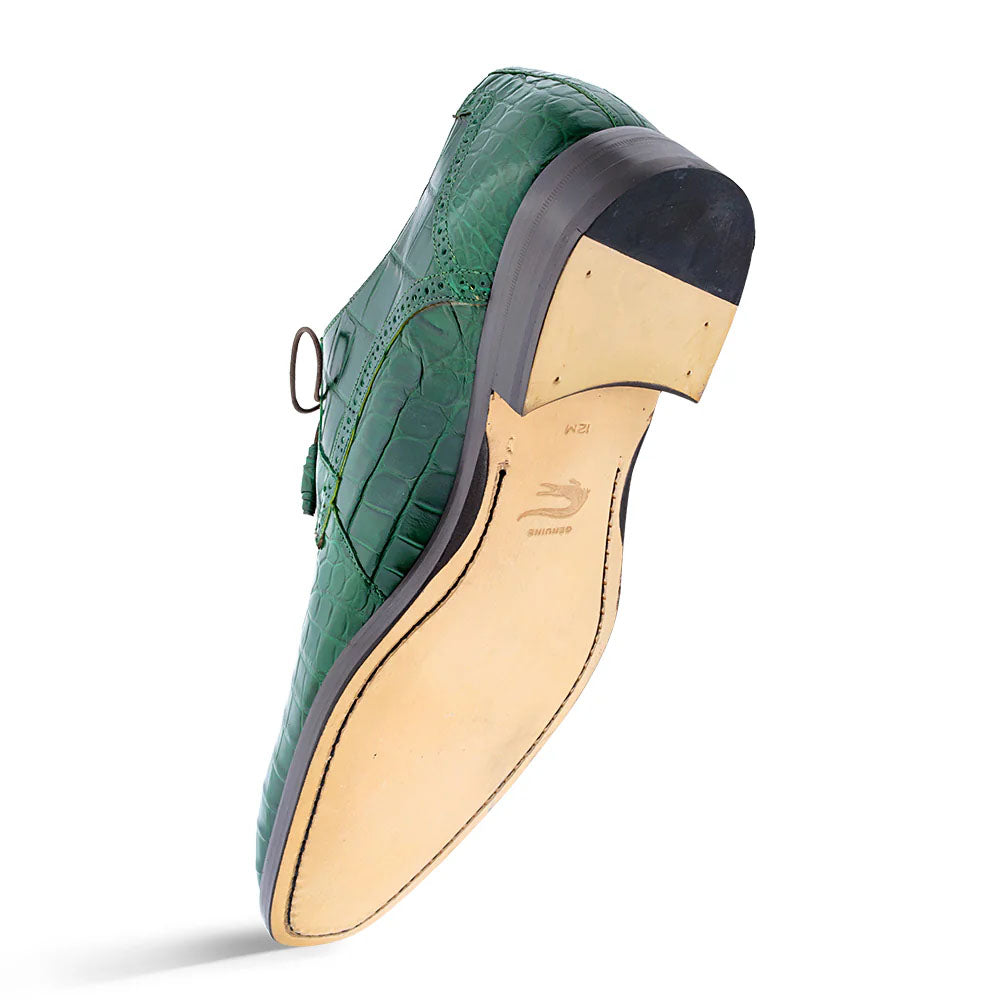 Mezlan Dandy Alligator lace-up in forest green. Sleek, elongated shape with raised heel. Distinct alligator skin upper. Smooth leather lining. Light beige sole with black rubber heel cap.