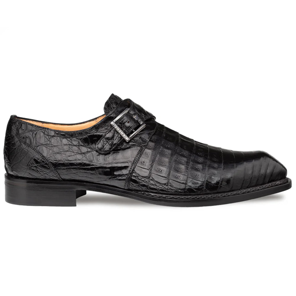 Mezlan Gigolo monk strap shoe: Black crocodile leather with a sleek, pointed design. Features a single strap & metallic buckle. High-gloss finish, textured scales, leather lining, and a raised heel.