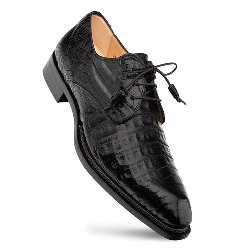 Black Mezlan Cratos Derby, featuring a pointed toe and embossed crocodile leather. Secured with black laces, it showcases a formal aesthetic with a slight heel.