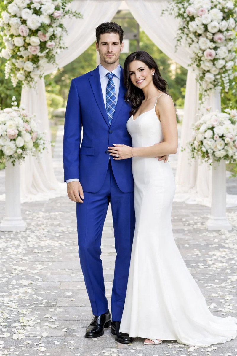 Blue, slim-fit suit with two-button closure and smooth fabric. Includes a classic check-patterned tie. Offers a sophisticated, tailored look.