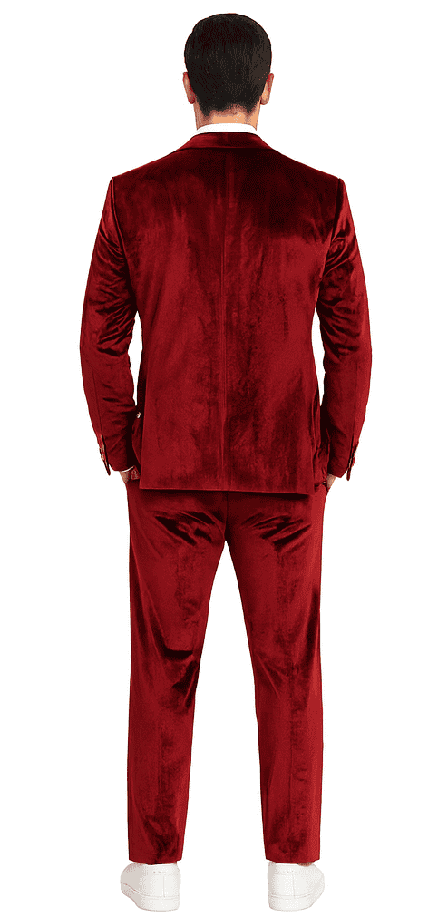 Burgundy velvet two-piece men's suit. Slim fit, peak lapel, luxurious reflective texture. Includes tailored jacket (single vent) and straight-cut trousers.
