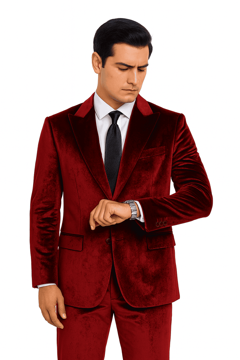 Burgundy men's velvet suit. Slim fit, peak lapel. Smooth texture, button jacket closure with two pockets. Matching tailored trousers. Elegant and stylish.