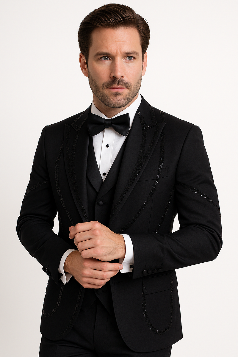 Italian wool tuxedo. Modern fit, black. Fitted jacket with satin lapels, decorative beading. Matching trousers, waistcoat. Two front pockets, cuff buttons. Sleek, solid black design.