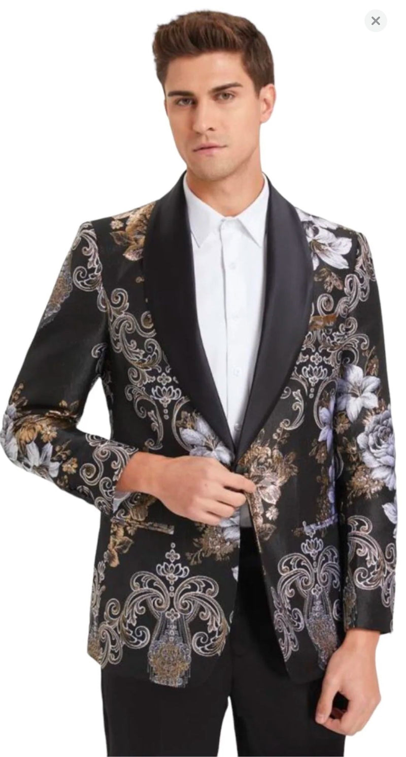 Men's black floral jacquard blazer with gold/silver ornate patterns and a satin shawl lapel. Paired with black pants and a bowtie for a stylish look.