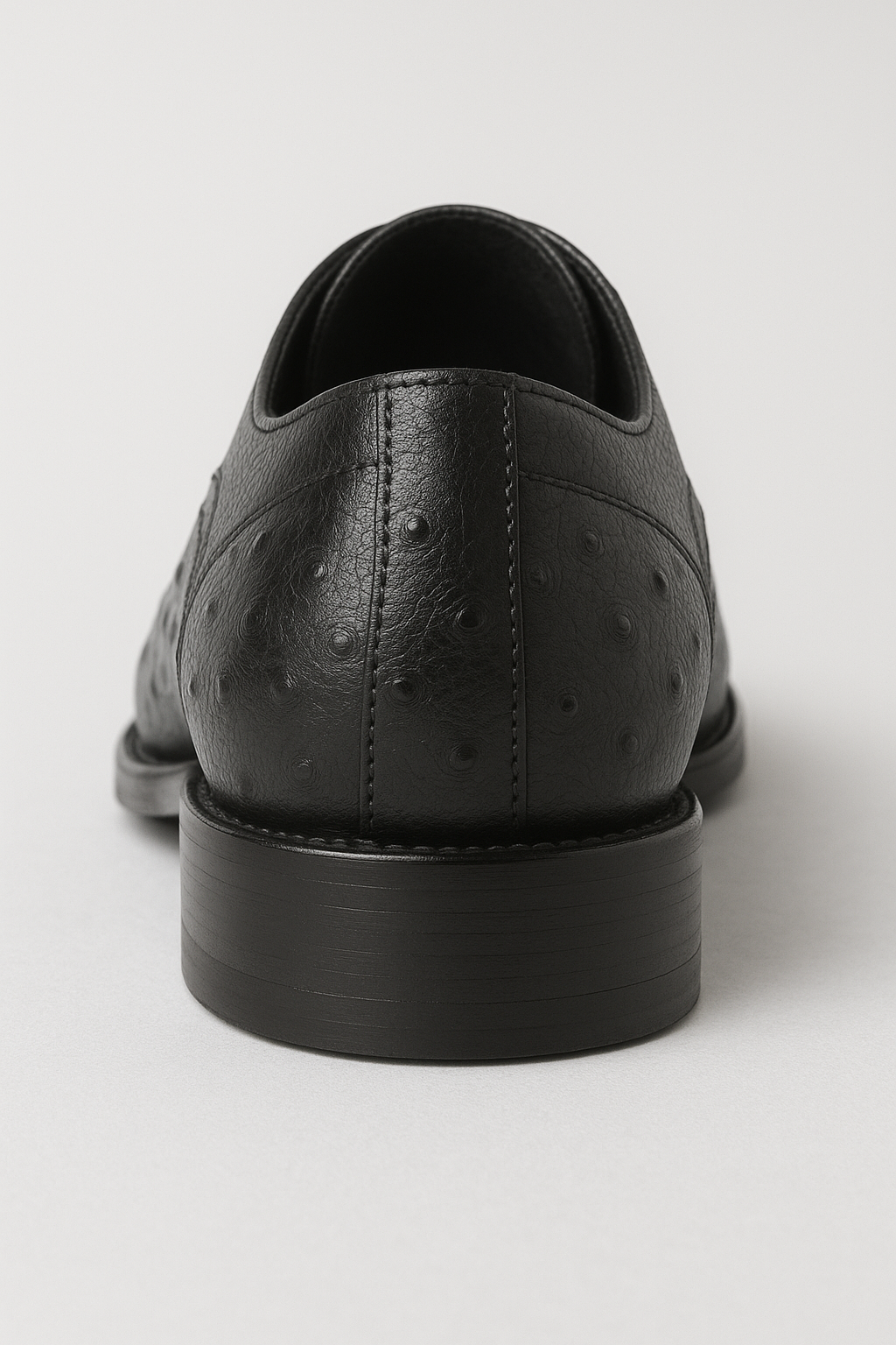 Mens Carrucci Ostrich Embossed Leather Wingtip Dress Shoe in Oxblood