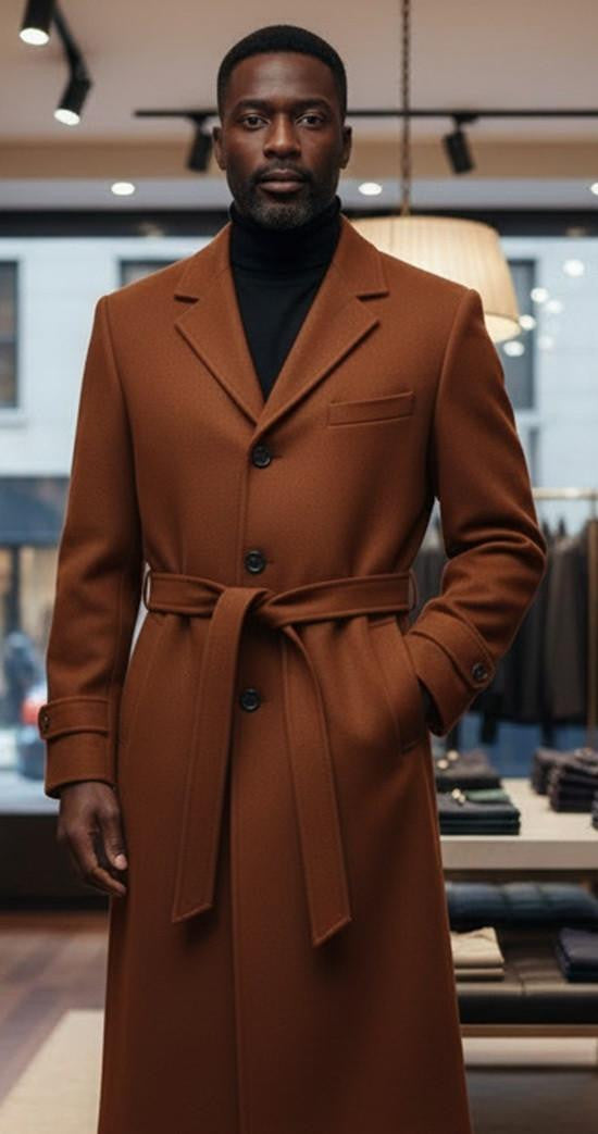 Men's cognac full-length overcoat. Structured silhouette, single-breasted, notch lapel, belted waist. Soft, textured fabric. Two front pockets, button closure and cuffs.