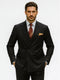 Alberto Nardoni's premium black double-breasted suit: structured silhouette, sharp lapels, smooth black poplin. Features two rows of buttons, fitted waist, flap pockets, and a contrasting pocket square. Paired with a light blue shirt and dark red tie.