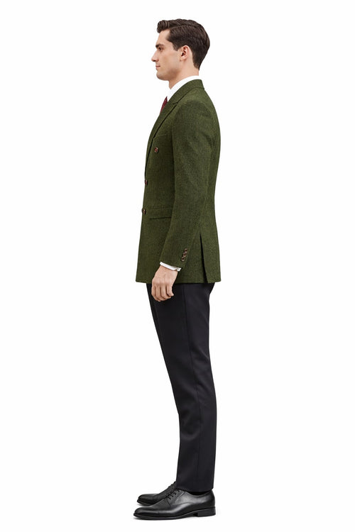 Men's dark green winter blazer. Tailored, double-breasted with textured fabric. Notch lapels, dual buttons, and paired with black trousers.
